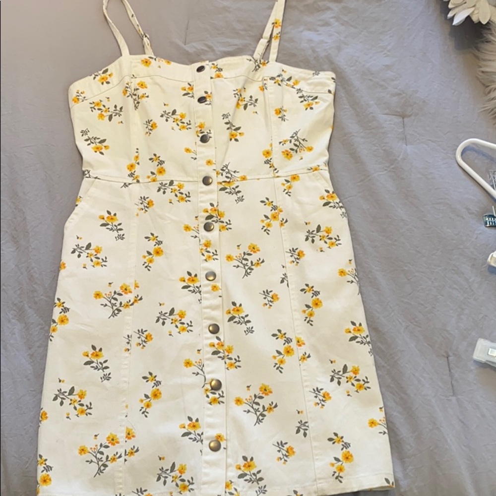 Yellow and white floral pleated dress with pockets